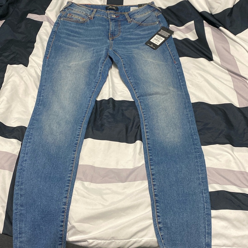 JENNIE MID RISE SUPER T SKINNY JEAN
